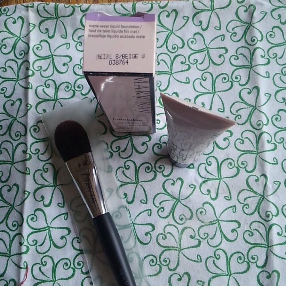 Mary Kay foundation and brush